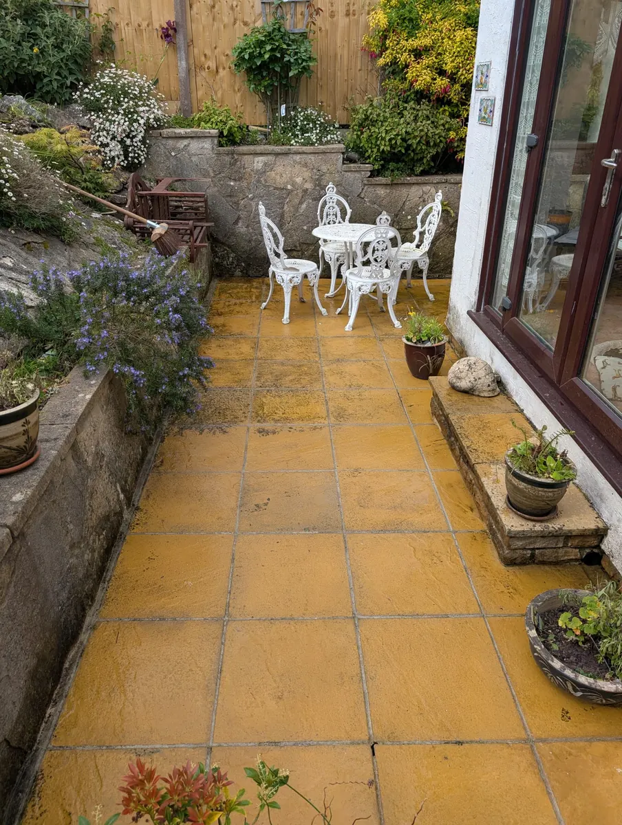 Clean patio after pressure washing