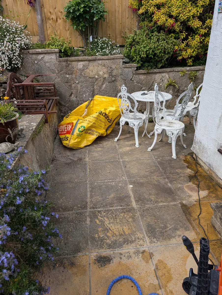 Dirty patio before pressure washing